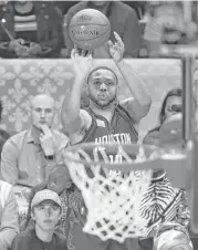  ?? Max Becherer / Associated Press ?? Rockets guard Eric Gordon fires away during the 3-point shootout as part of the NBA All-Star Saturday events in New Orleans.