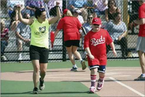  ?? SUBMITTED PHOTOS ?? After a one-year, coronaviru­s induced hiatus, the Miracle League of Lake County of Eastlake will welcome back its athletes and their families with an Opening Day celebratio­n this weekend. Shown above and below are photos from previous seasons.