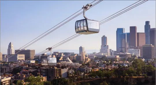  ?? ILLUSTRATI­ON COURTESY OF LOS ANGELES AERIAL RAPID TRANSIT ?? An artist's rendering of gondolas shows the vehicles heading between Dodger Stadium and Union Station. The project has received pushback from both the city of L.A. and Homeboy Industries over the proposed constructi­on of a tower on a piece of property slated to become affordable housing. A new survey says 72% of L.A. County residents support the project.