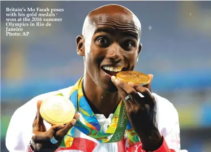  ??  ?? Britain’s Mo Farah poses with his gold medals won at the 2016 summer Olympics in Rio de Janeiro Photo: AP