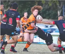  ?? Picture: JASON O'BRIEN ?? Southport Tigers' Brock Hamill runs the ball.