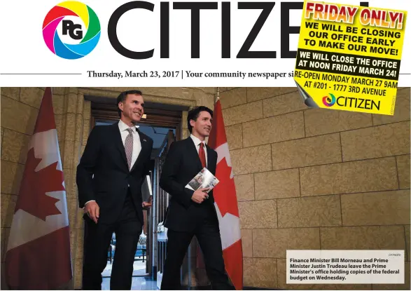  ?? CP PHOTO ?? Finance Minister Bill Morneau and Prime Minister Justin Trudeau leave the Prime Minister’s office holding copies of the federal budget on Wednesday.