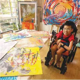  ?? ALL PIX BY HAFIZ SOHAIMI/THESUN ?? Branden with his paintings. –