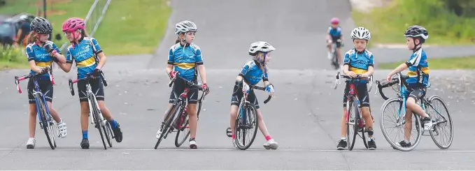  ??  ?? Gold Coast Cycling Club junior members love to have a chat before their races. Pictures: GLENN HAMPSON