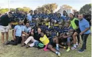  ?? Picture:SIVENATHI GOSA ?? TRIUMPHANT: Winners of the Eastern Cape Super 12 Rugby Tournament, EL Police, lift their trophy after beating PE SAPS 26-13 at Kemsley Park in Port Elizabeth on Saturday