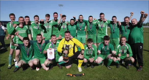  ??  ?? Kiltealy Celtic celebrate after winning the Gwyn Jones Cup final, to add to their Division 5 success.