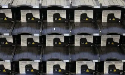  ?? ?? Ballots go through ballot processing equipment at the Philadelph­ia Ballot Processing Center. Photograph: Ryan Collerd/AFP/Getty Images