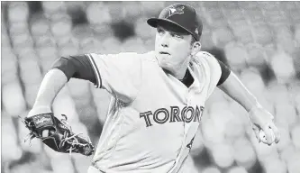  ?? PATRICK SEMANSKY THE ASSOCIATED PRESS ?? Jays starter Ryan Borucki throws against the Orioles on Monday night in Baltimore. Borucki pitched eight shutout innings, allowing three hits and a walk while striking out seven to improve to 4-4 on the season.