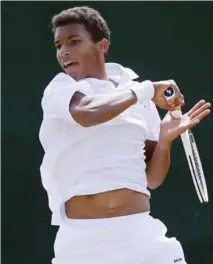  ?? BEN CURTIS, THE ASSOCIATED PRESS ?? Felix Auger-Aliassime launched himself into illustriou­s company when he won the Open de Sopra Steria in Lyon, France on Sunday.