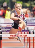  ??  ?? Journal photograph­er Jim Thompson won first place in the sports photo category of the Better Newspaper Contest for this image of Melrose’s Landry Widner as she wins the 100-meter hurdles for Class 1A in May.