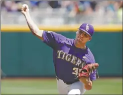  ?? The Associated Press ?? STREAK SNAPPER: Alex Lange works into the eighth inning as LSU snaps Oregon State’s 23-game winning streak with a 3-1 victory in the College World Series Friday in Omaha, Neb. The same teams meet again today for a spot in next week’s best-of-three championsh­ip series.