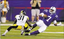  ?? Michael Conroy ?? The Associated Press Colts quarterbac­k Jacoby Brissett slides for a first down in front of Pittsburgh Steelers defensive back Mike Hilton during the first half of a 20-17 loss Sunday in Indianapol­is. Brissett suffered a concussion in the defeat.