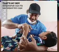  ?? ?? THAT’S MY BOY Abdulwahab says his son helped him cope