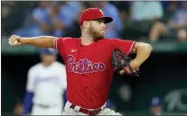  ?? TONY GUTIERREZ — THE ASSOCIATED PRESS ?? Phillies starting pitcher Zack Wheeler throws in the first inning on Wednesday, in Arlington, Texas.