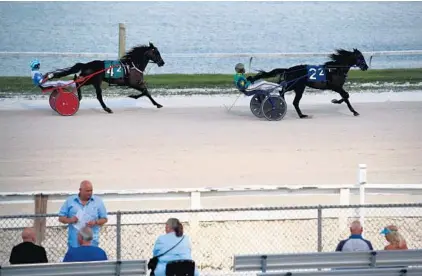  ?? JOHN MCCALL/SOUTH FLORIDA SUN SENTINEL ?? Harness racing at Isle Casino Racing Pompano Park in Pompano Beach, a decades-old tradition, could be ending soon. The sport’s outcome in Florida depends largely on this month’s special legislativ­e session.