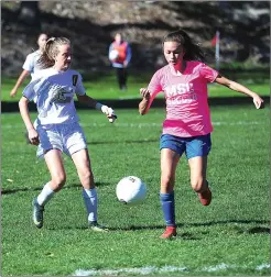  ?? Photo by Ernest A. Brown ?? Sadie Crozier (0, above), Jessica Karspeck (2, right) and the North Smithfield girls soccer team defeated Karissa Ciullo (above) and Mount St. Charles, 4-0, in a Division II contest Saturday morning.