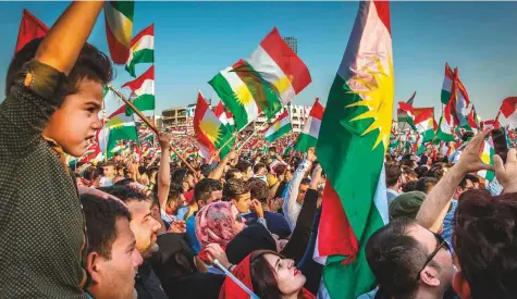  ?? AFP ?? Kurds gather for a pro-independen­ce rally in Arbil, the capital of Iraqi Kurdistan, in 2017. Iraqi forces drove out the Kurdish Peshmerga and retook Arbil after the Kurds went ahead with a controvers­ial vote on independen­ce in 2017.