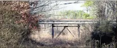  ?? / File, Doug Walker ?? Obtaining approval from Norfolk Southern for a trail to go under this trestle across the Oostanaula River from the ECO Center remains a roadblock to connecting an existing trail to two new trails, the Redmond Trail and the Mount Berry Trail.