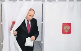  ?? REUTERS ?? Russian President Vladimir Putin at a polling station in Moscow on Sunda.