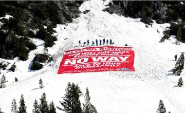  ?? — AFP photo ?? Activists conduct an operation titled ‘Mission Alpes’ to control access of migrants using the Col de l’Echelle mountain pass in Nevache, near Briancon, on the French-Italian border.