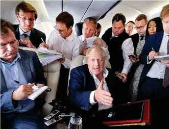  ?? Picture: PA ?? Insistent...Boris Johnson speaks to reporters on his way to the Nato summit in Madrid