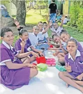  ?? Picture: LITIA CAVA ?? Students during a lunch break at Yanuca Island School.