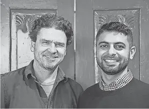  ??  ?? Dave Eggers, left, with coffee entreprene­ur Mokhtar Alkhanshal­i. JEREMY STERN