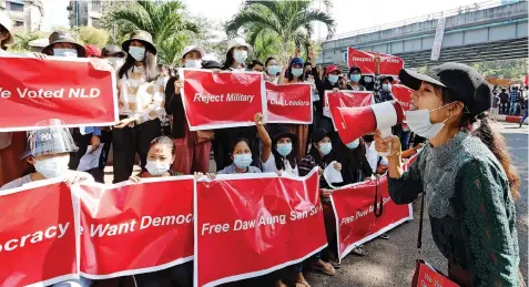 ?? | Reuters ?? DEMONSTRAT­ORS protest against the military coup, in Yangon, Myanmar, yesterday.