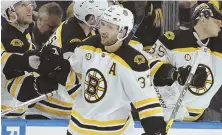  ?? AP PHOTO ?? CENTER OF CONCERN: Patrice Bergeron celebrates a goal Tuesday night against the Lightning, but his injury could be a big issue for the Bruins offense.