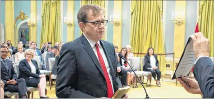  ?? CP PHOTO ?? Jonathan Wilkinson is sworn in as federal Minister of Fisheries Wednesday at Rideau Hall in Ottawa, Ont.