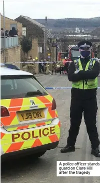  ??  ?? A police officer stands guard on Clare Hill after the tragedy