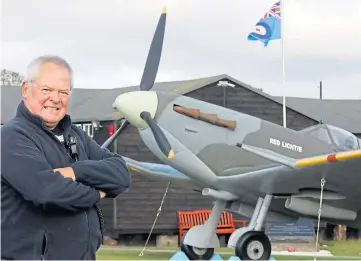  ??  ?? WARTIME ROLE: Stuart Archibald of Montrose Air Station Heritage Centre beside the replica of the Red Lichtie Spitfire. Picture by Gareth Jennings.