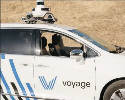  ?? PHOTOS BY IAN C. BATES — THE NEW YORK TIMES ?? Voyage tests its self-driving car at an empty office park in San Jose in early May. Tech companies once promised self-driving cars would be fully functional and on the road by 2020, but a decade later, technology is still far from ready.