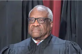  ?? J. SCOTT APPLEWHITE/AP FILE ?? Justice Clarence Thomas was in his third year on the Supreme Court when he paid off the last of his law school debt.