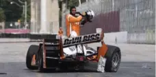  ?? MARK BLINCH/THE CANADIAN PRESS ?? Juan Pablo Montoya exits his car after crashing at the final turn.