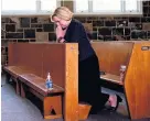  ?? PHOTO: GETTY IMAGES ?? Genuflect . . . National Party leader Judith Collins prays before voting at St Thomas’ Church in Auckland last weekend.