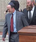  ?? USA TODAY NETWORK ?? A casket is carried from the Rodef Shalom synagogue Tuesday in Pittsburgh.