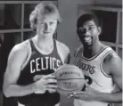 ?? Getty Images file ?? Larry Bird and Magic Johnson eventually became pals.