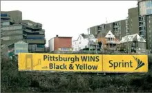  ?? Rebecca Droke/Post-Gazette ?? The vinyl Sprint advertisin­g sign on Mount Washington as seen in February 2017. The city demanded that Lamar Advertisin­g remove the sign after the zoning board of adjustment found that the banner violates the city zoning code.