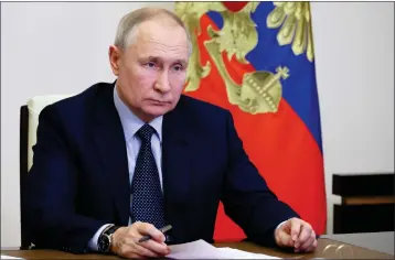  ?? MIKHAIL KLIMENTYEV, SPUTNIK, KREMLIN POOL PHOTO VIA AP ?? A senior U.S. official said recently that Russian President Vladimir Putin may well have come to the conclusion that the nuclear threats, which he once saw as leverage, were backfiring.