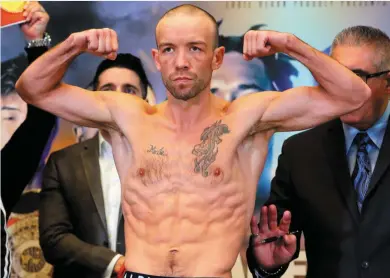  ?? SPORTSFILE ?? TJ Doheny weighs in ahead of his IBF World super-bantamweig­ht title bout with Ryohei Takahashi at New York’s Madison Square Garden last night