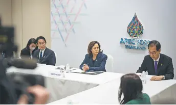  ?? — AFP photo ?? Han (right) speaks as Harris (centre) and Kishida look on at a meeting between allies following North Korea’s recent ballistic missile launch during the Asia-Pacific Economic Cooperatio­n (APEC) summit in Bangkok.