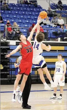  ?? Photograph­s by Samantha Huffman ?? Blackhawk senior David Andrus at the beginning jump on Friday, Jan. 29, in Harrison, Ark. Andrus scored the first goals Friday.