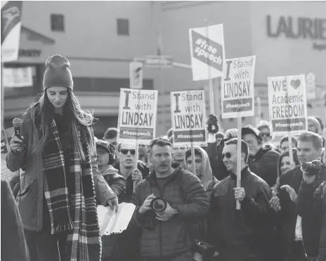  ?? TYLER ANDERSON/FILES ?? Then-teaching assistant Lindsay Shepherd garners support in a rally for academic freedom in Waterloo, Ont., last November. She is suing Wilfrid Laurier for $3.6 million after she was discipline­d for showing a controvers­ial video about gender-neutral...