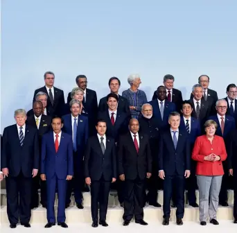  ??  ?? The group photo of world leaders at the G20 Leaders Summit in Hamburg in July 2017