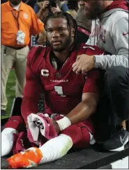  ?? (AP/Rick Scuteri) ?? Arizona Cardinals quarterbac­k Kyler Murray is out for the remainder of the season after tearing his ACL on Monday night against the New England Patriots in Glendale, Ariz. Murray injured his knee on the third play of the game.