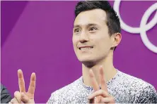  ??  ?? Figure skater Patrick Chan reacts as his score is posted after his performanc­e in today’s short program. He stumbled on his triple Axel, leaving him in sixth place ahead of Saturday’s free skate.