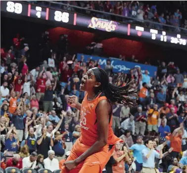  ?? SEAN D. ELLIOT/THE DAY ?? Center Jonquel Jones celebrates after the Connecticu­t Sun ended their regular season by holding off the Los Angeles Sparks 89-86 on Sunday at Mohegan Sun Arena. The Sun earned a bye into the second round and will host an opponent to be determined on Thursday at 8:30 p.m.