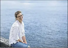  ?? CP PHOTO ?? Anika Riopel, who is part of a team pitching a public swimming area for the Halifax Harbour, poses on the waterfront in Halifax.