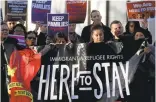  ?? PATRICK TEHAN/STAFF ?? Attendees hold signs during a San Jose news conference about immigrant rights in January following executive orders on immigratio­n from President Donald Trump.